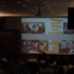 Participants watches the media broadcast photo 1.